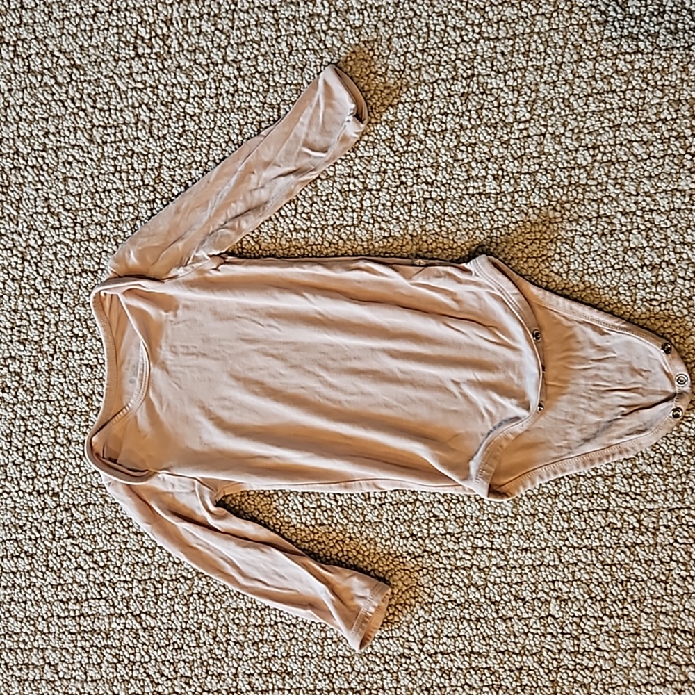 Kyte Baby Longsleeve Bodysuit in Porcelain 6-12 Months